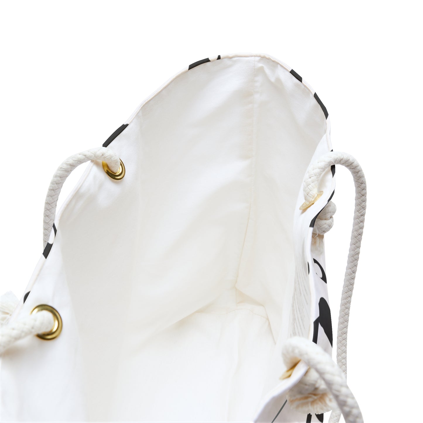 White drawstring bag with black patterns on a white background