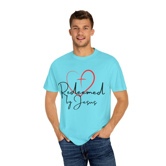 Man wearing a light blue t-shirt with a heart and "Redeemed by Jesus" text design on a white background