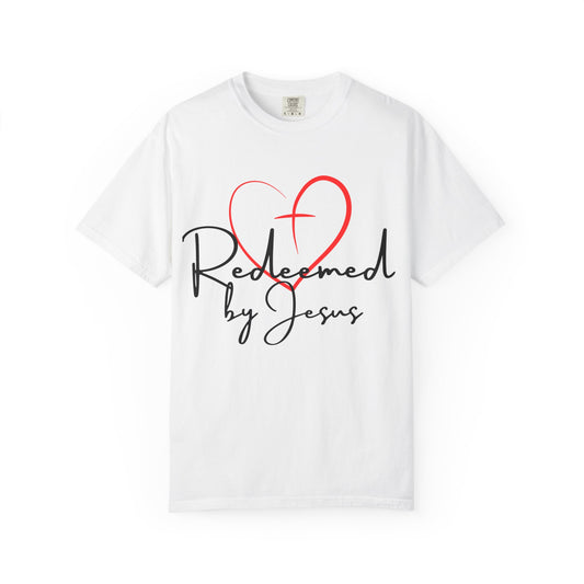 White t-shirt with a red heart and black text 'Redeemed by Jesus' on a white background