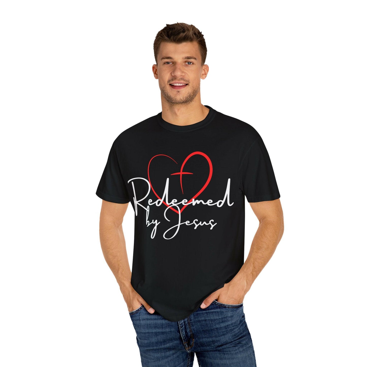 Man wearing a black t-shirt with 'Redeemed by Jesus' design on a white background