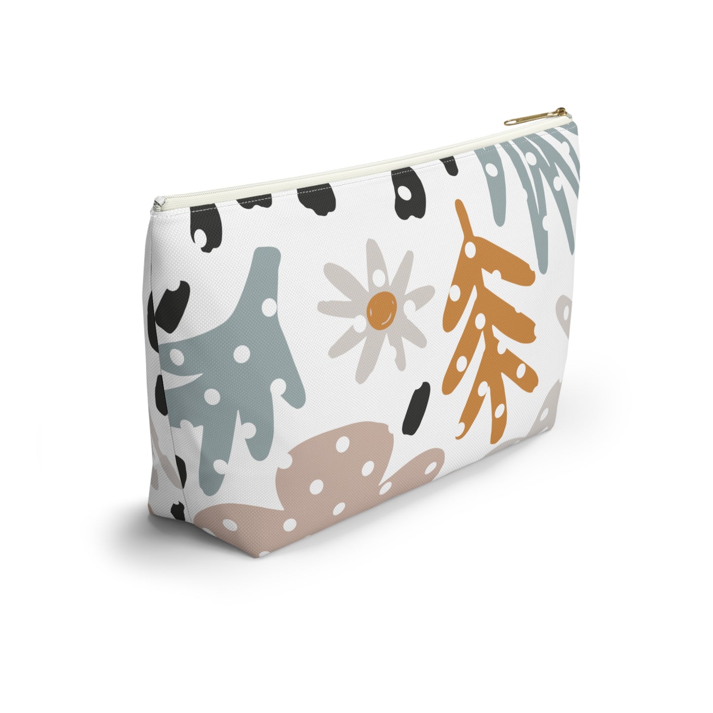 Cosmetic bag with abstract floral and leaf pattern on a white background