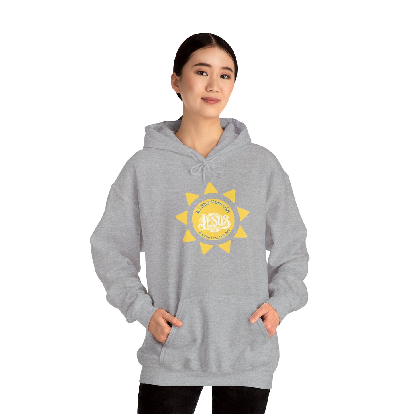 Person wearing a gray hoodie with a yellow graphic design on a white background