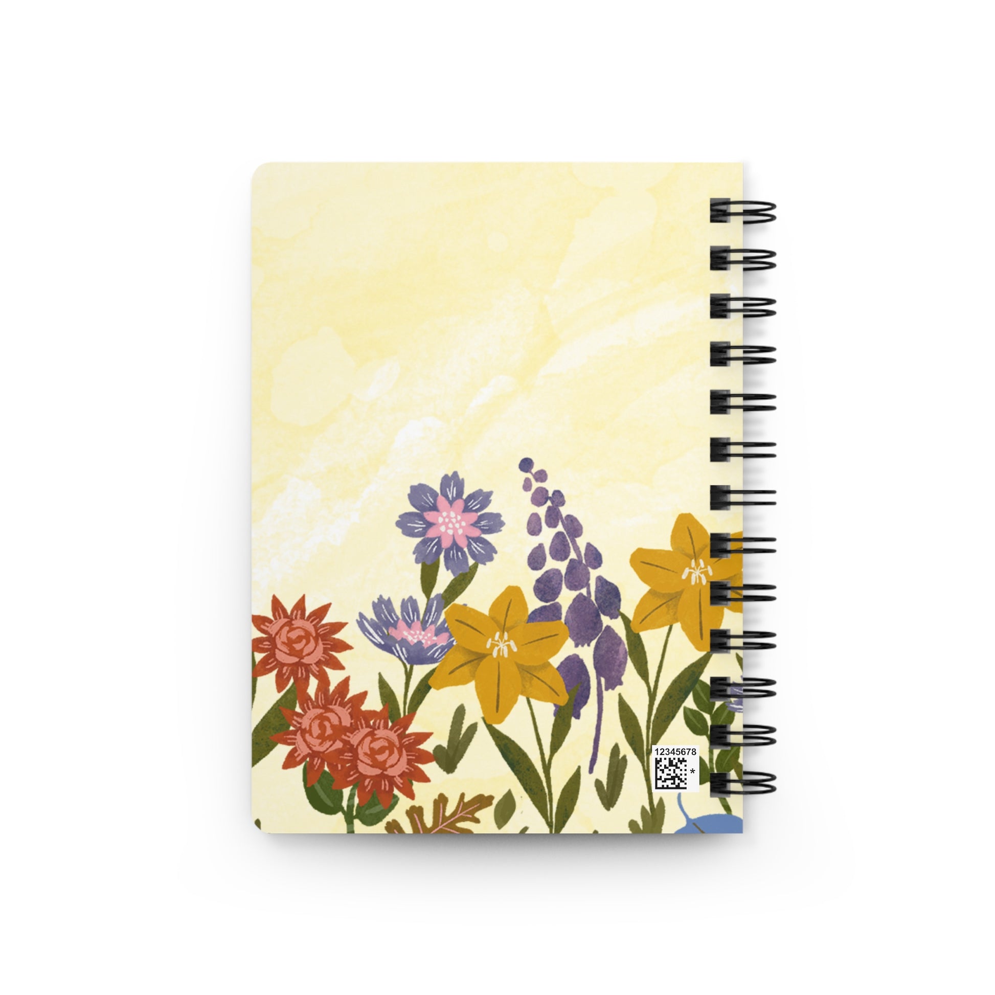 Back cover view of notebook with floral design on a yellow background