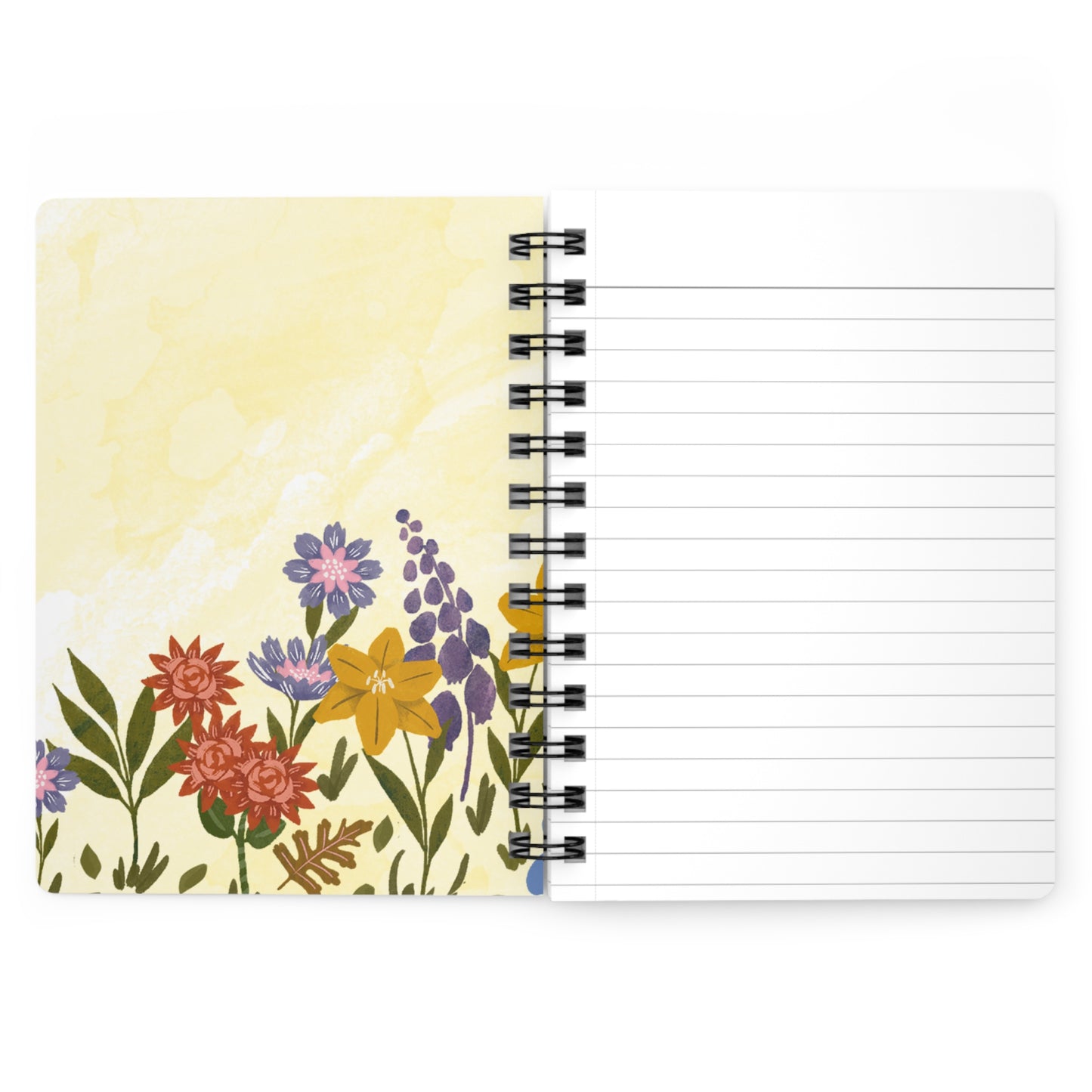 Inside front-cover view of a notebook with floral design on the cover and lined pages.