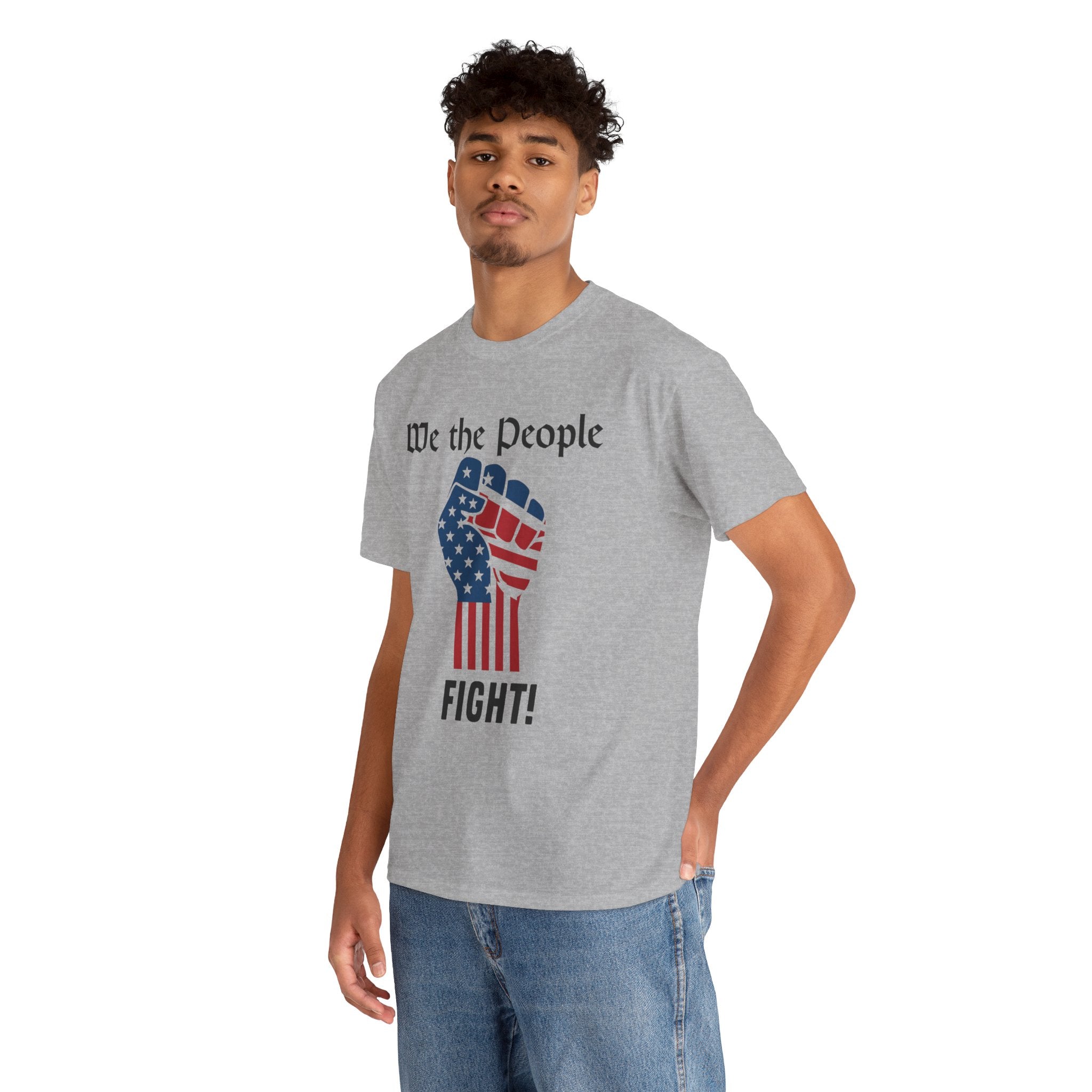 Person wearing a gray t-shirt with 'We the People' and fist graphic on a white background