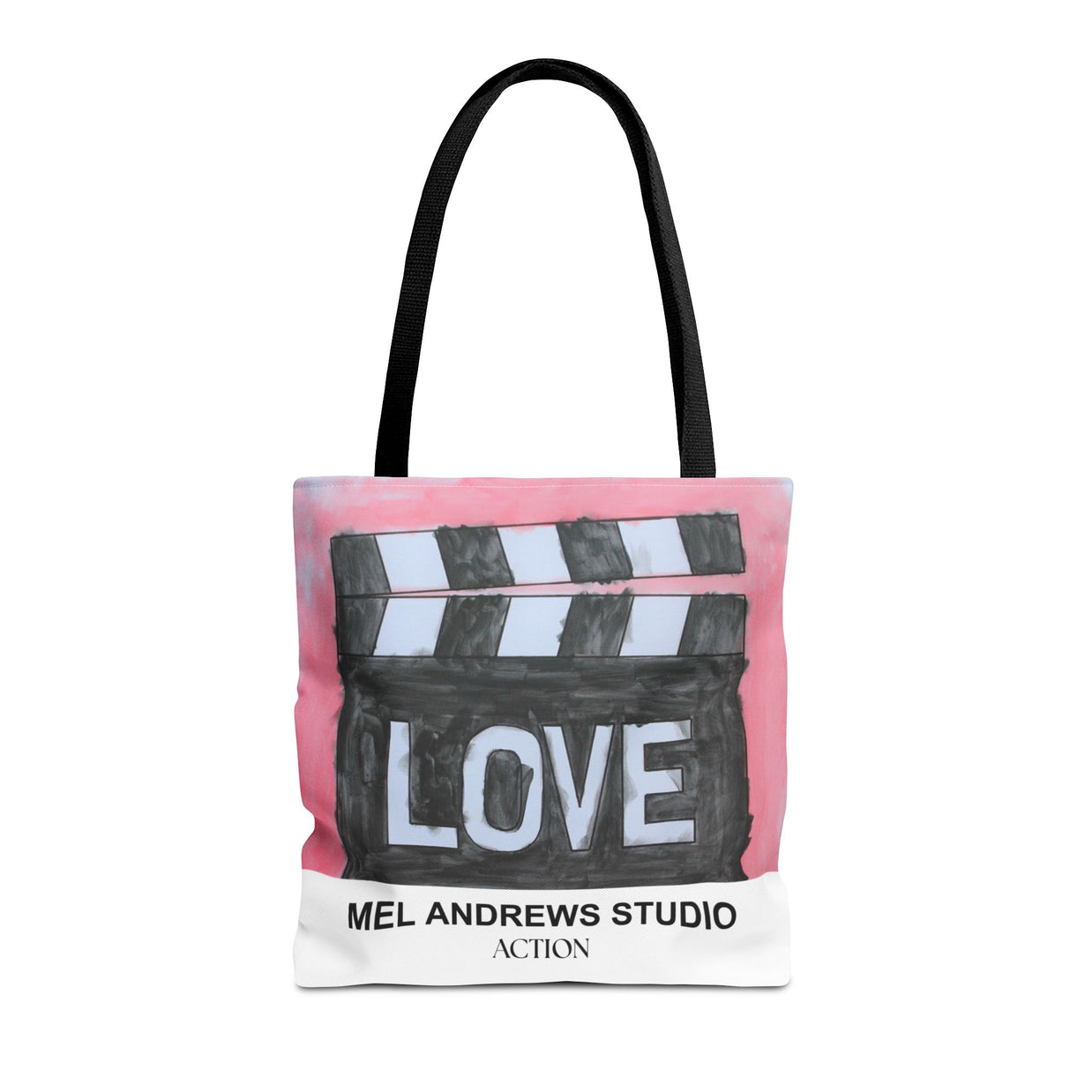 Tote bag with clapperboard design and 'Mel Andrews Studio' text on a white background