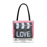 Tote bag with clapperboard design and 'LOVE' text on a white background