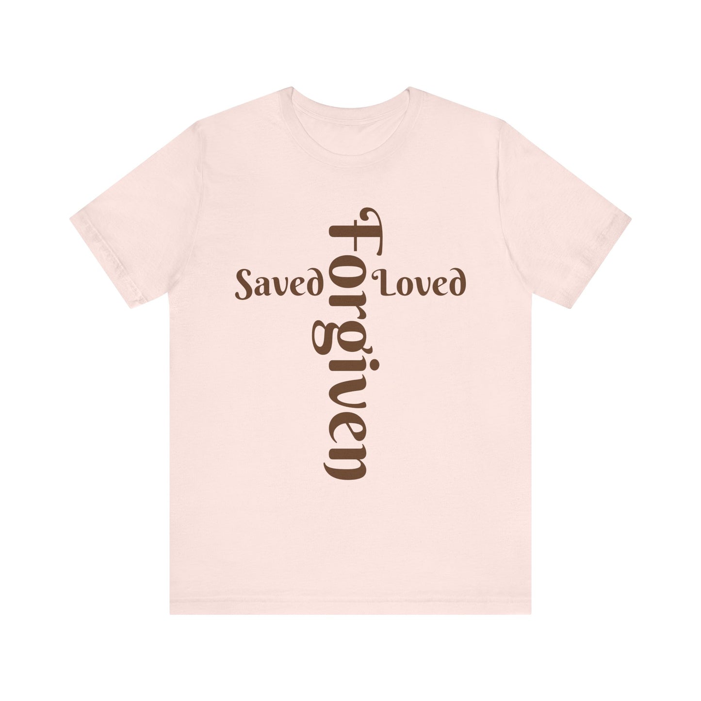 Pink t-shirt with 'Saved Loved Forgiven' text on a white background