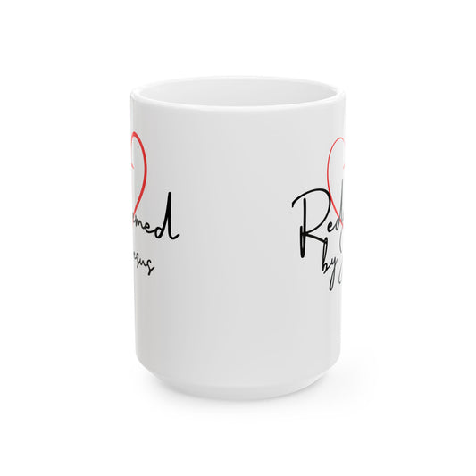 White mug with text and heart designs on a white background