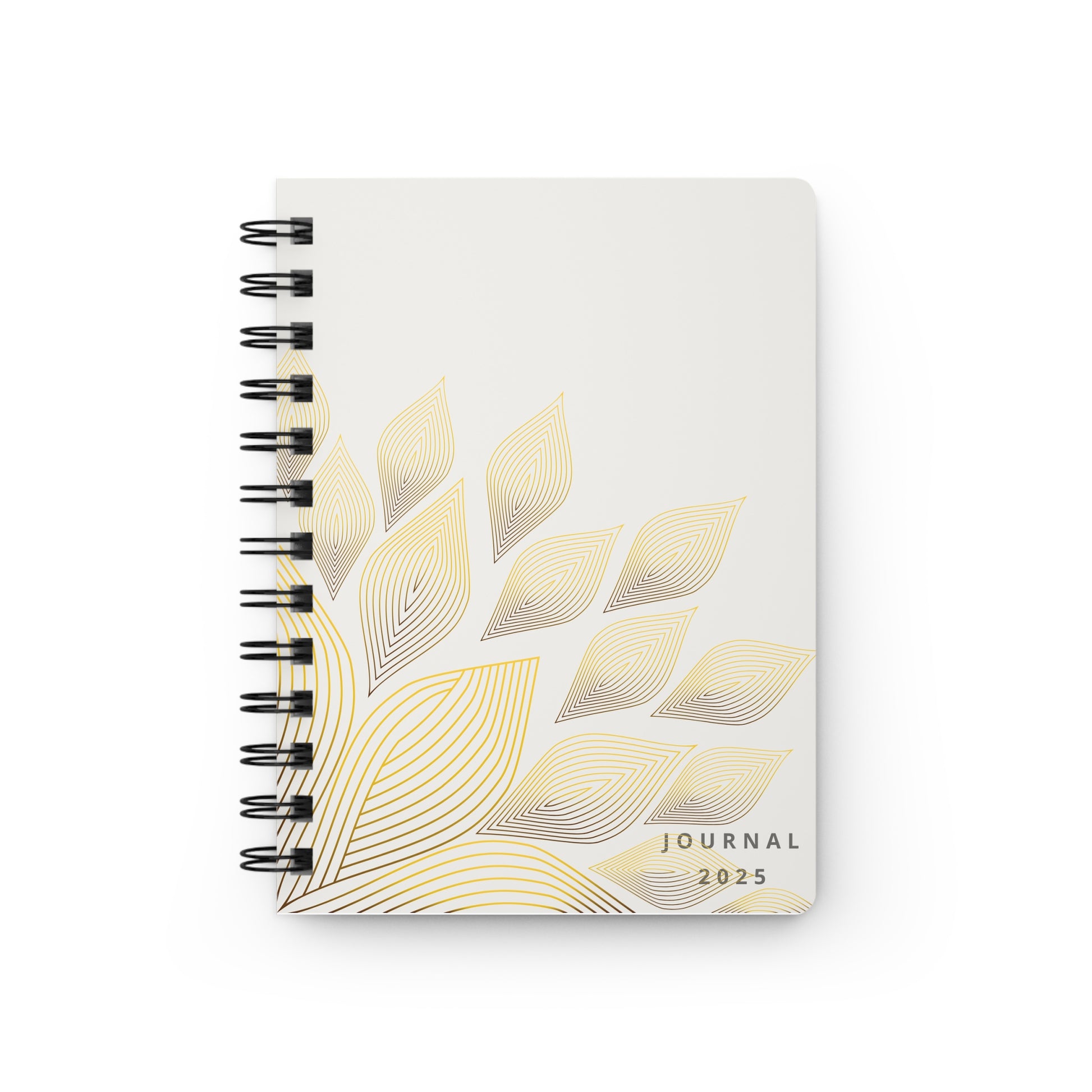 Journal with gold leaf design on a white background