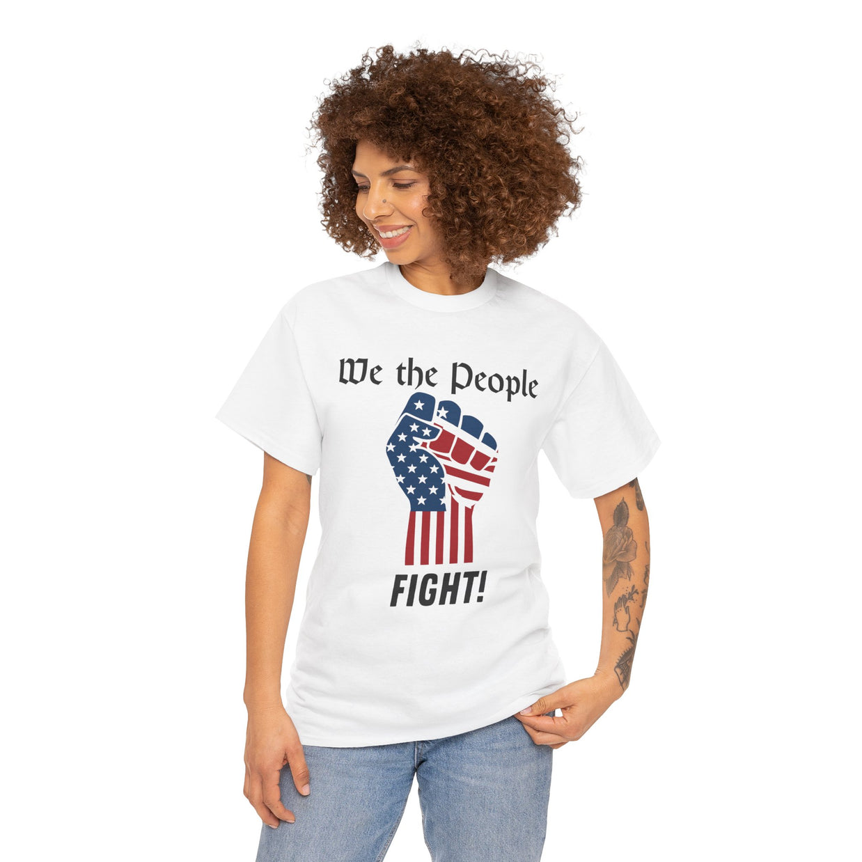 Woman wearing a white t-shirt with 'We the People' and fist graphic on a white background