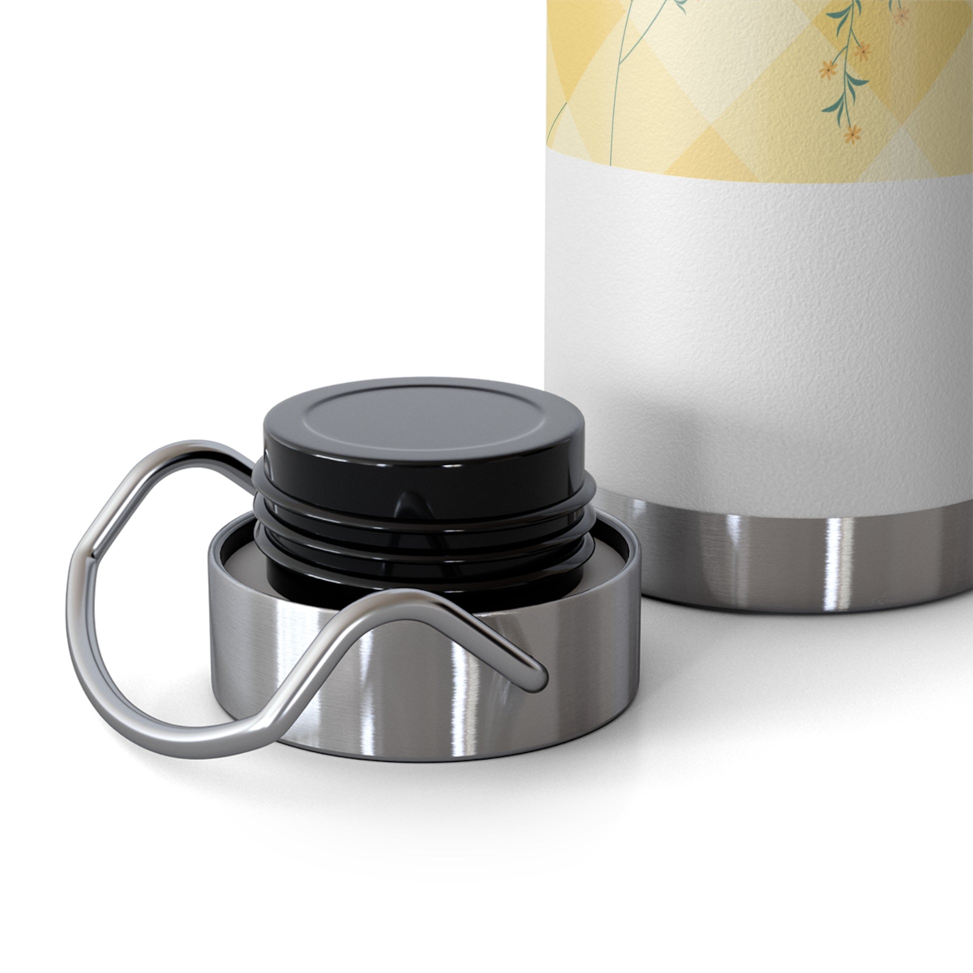 Close-up of a silver and black lid with a carabiner on a white background