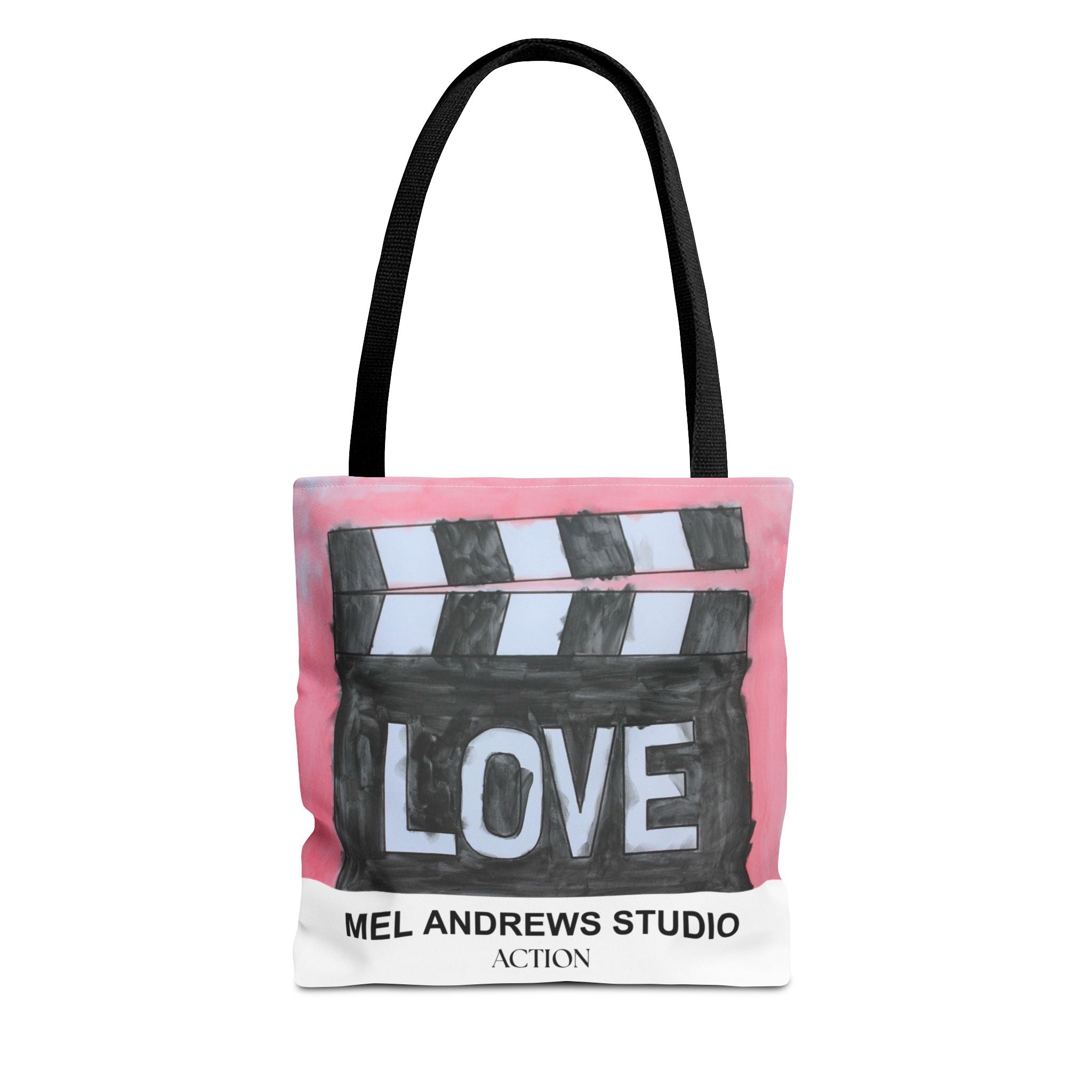 Tote bag with clapperboard design and 'Mel Andrews Studio' text on a white background