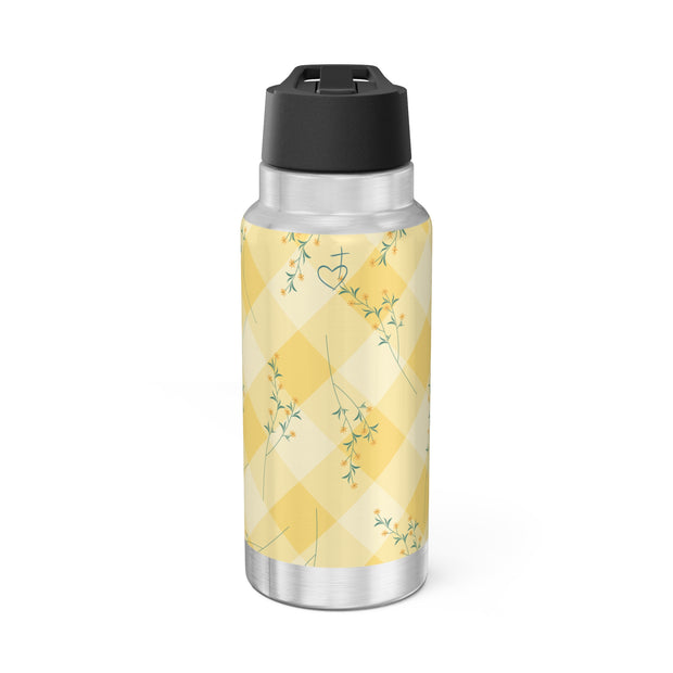 Stainless steel water bottle with yellow patterned label on a white background