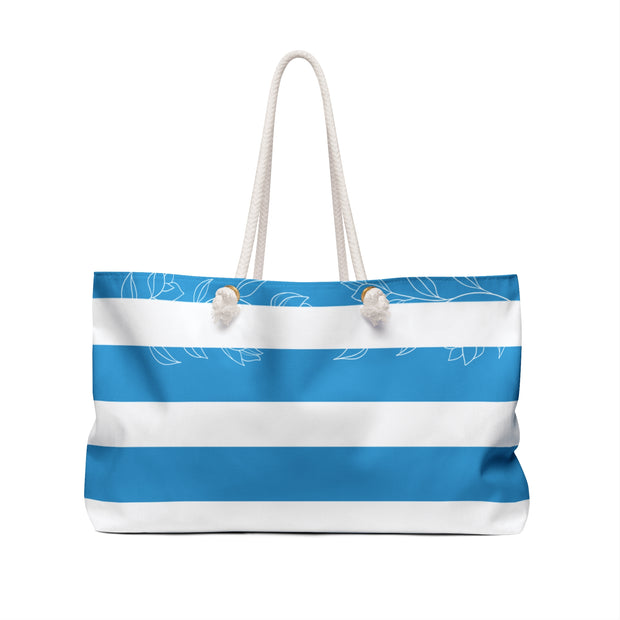 Tote bag with blue and white stripes on a white background
