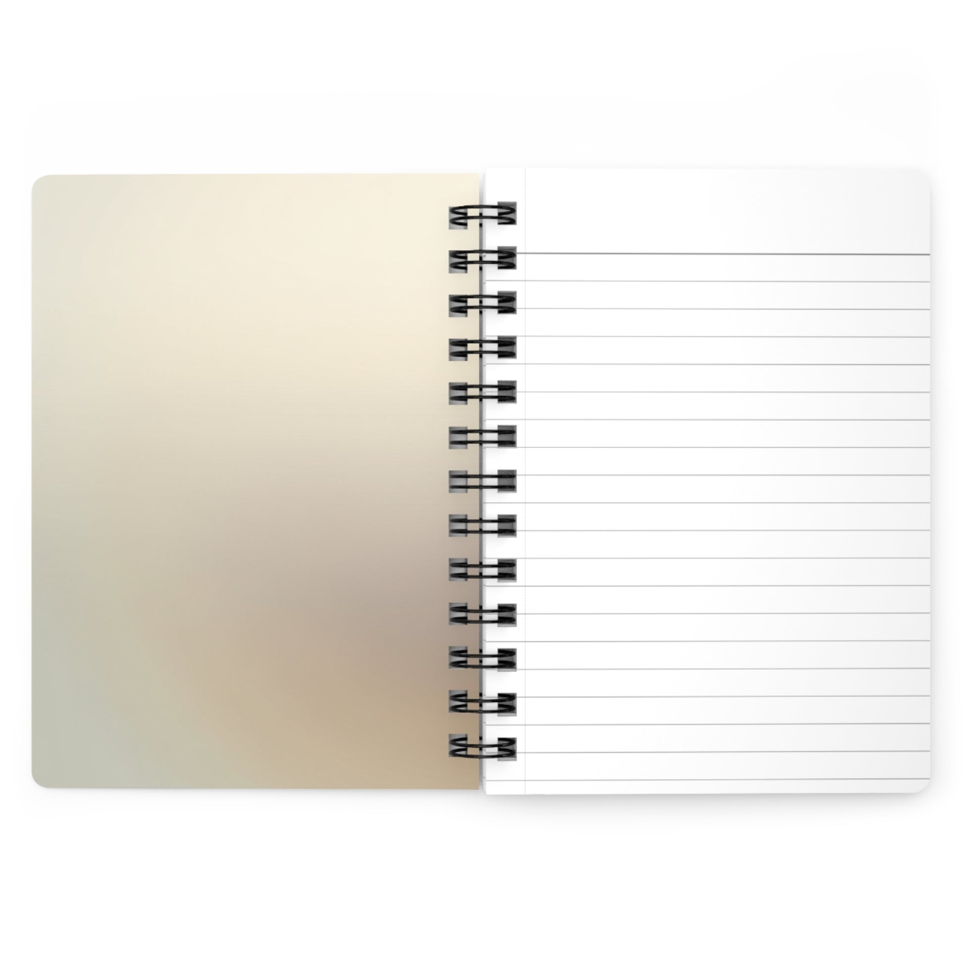 Open view of notebook with beige cover and lined pages on a white background